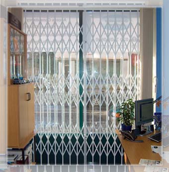 Retractable Security Grille in London, Collapsible Gates.