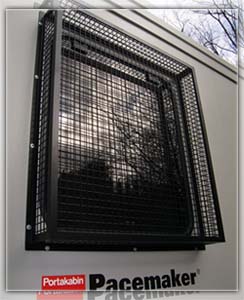 Mesh grille cage for window in london to protect against vandalism.